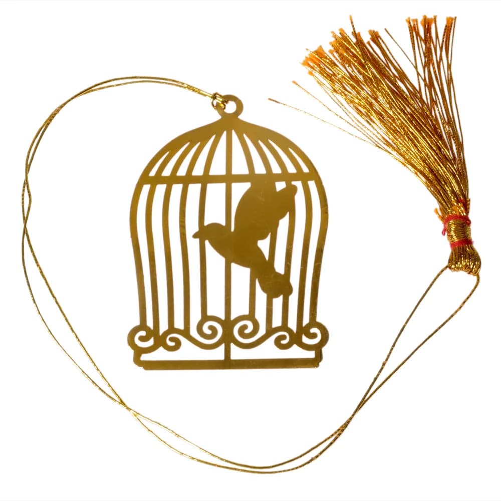 Die-cut gold-tone bookmark of a domed birdcage with one perched bird inside and a scrolled base, on a gold cord with a tassel