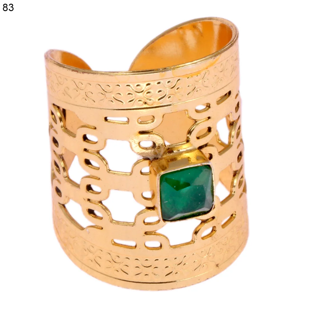 Gold-plated brass adjustable ring with a interlocking chain-loop openwork band and a single bezel-set faceted green stone