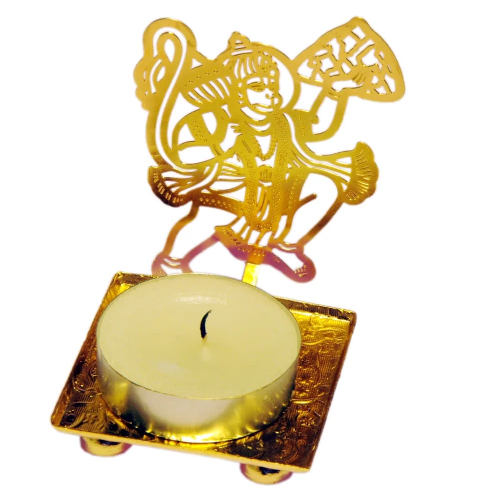 Pierced gold-tone tealight holder cut as Hanuman in flight carrying his mace and the Sanjeevani mountain, on a square tray