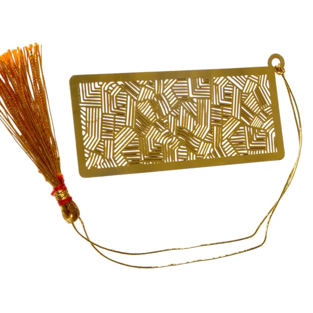 Die-cut gold-tone bookmark of an all-over maze of hatched geometric blocks filling a wide rectangle, on a gold cord with a tassel