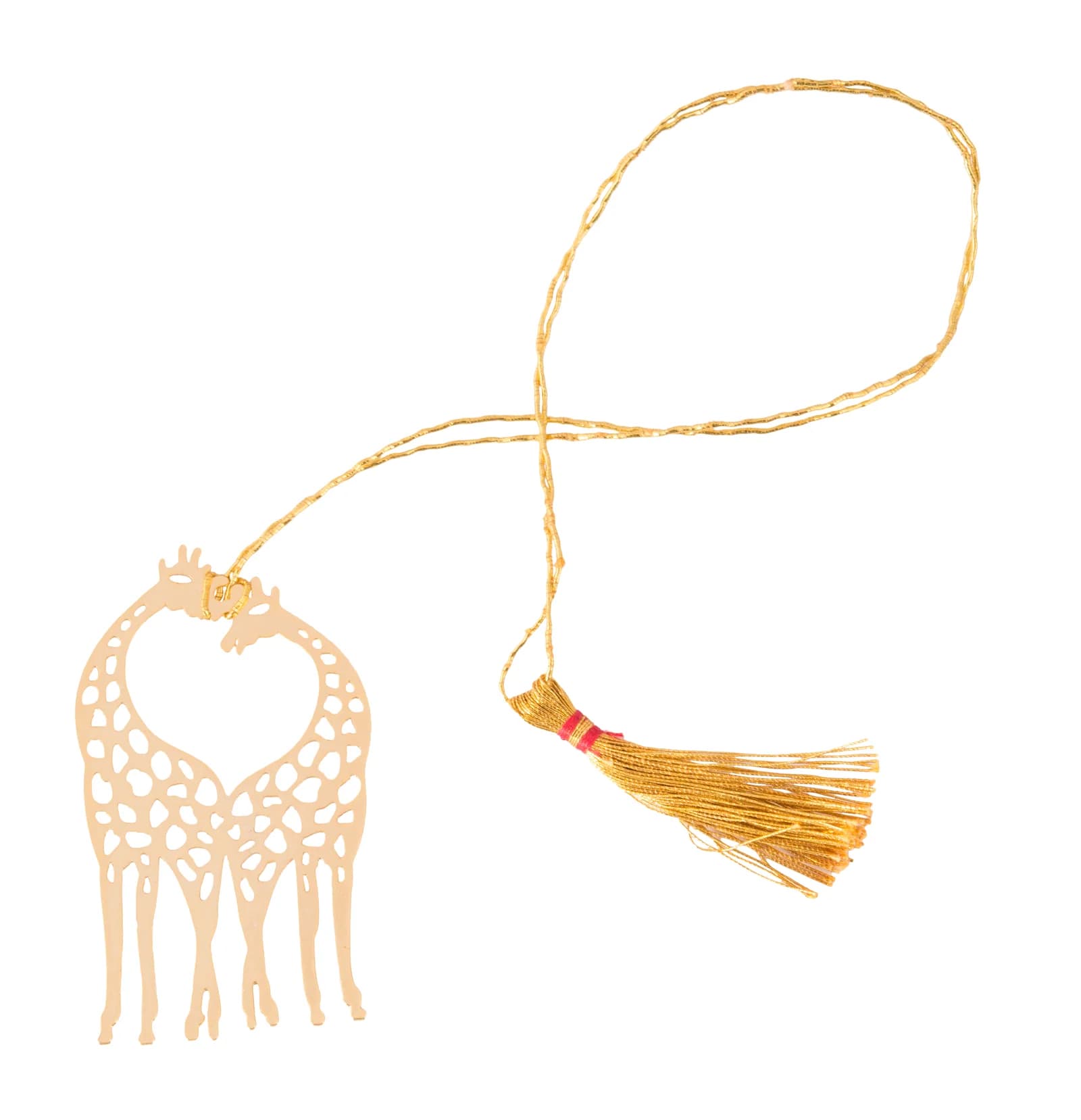 Die-cut gold bookmark of two giraffes facing each other so their necks form a heart, laid out with its gold cord and tassel