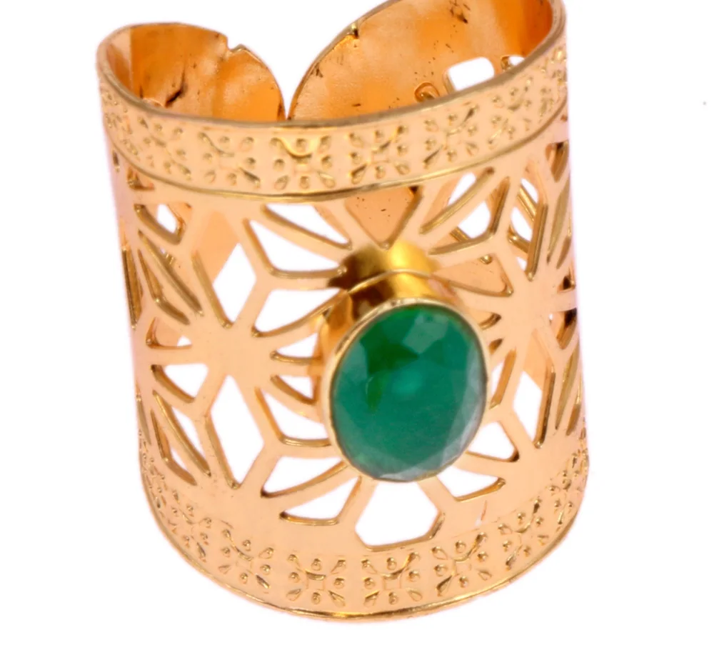 Gold-plated adjustable statement ring with openwork filigree and a faceted green stone