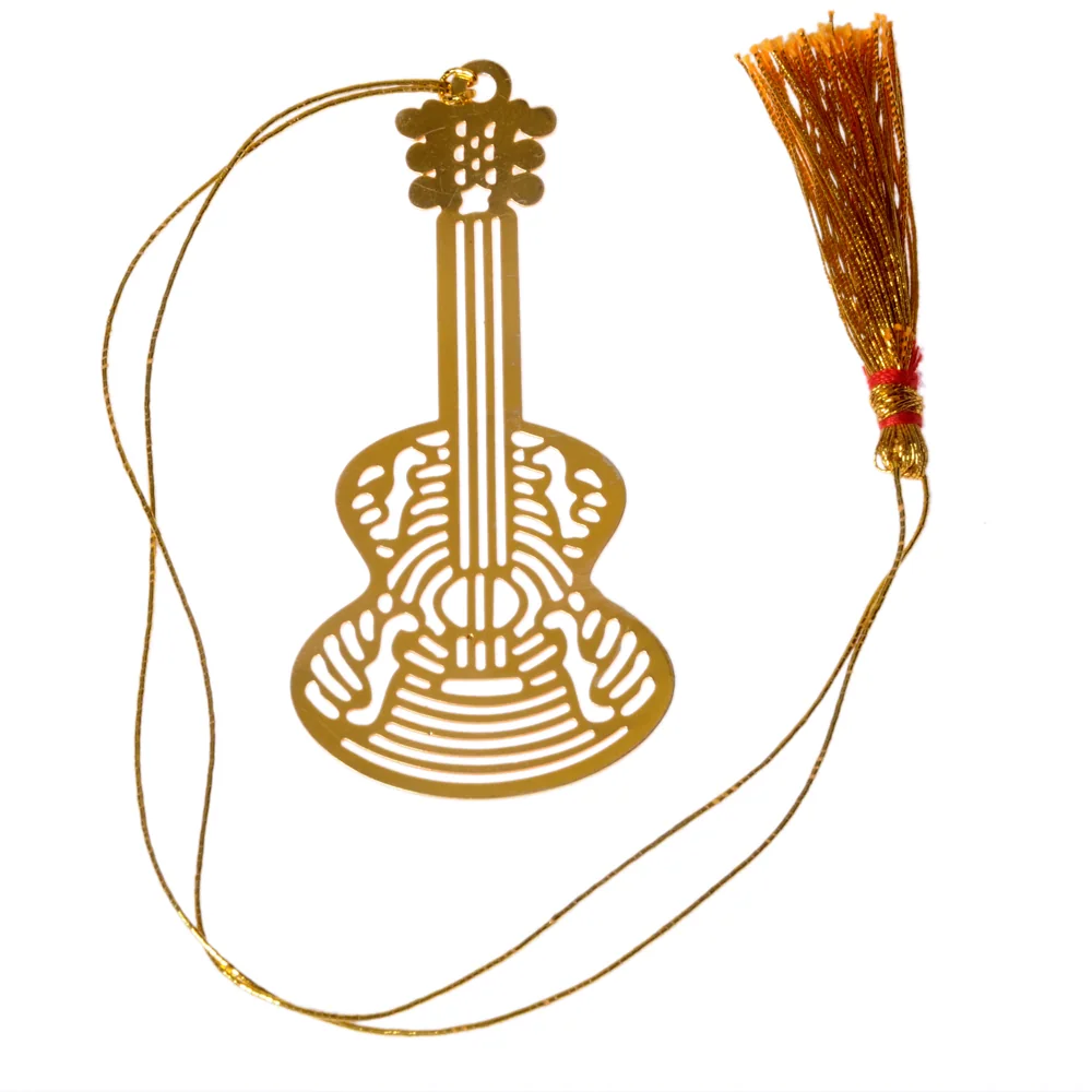 Die-cut gold-tone bookmark of an acoustic guitar with its body filled in fine lacework, on a gold cord with a tassel