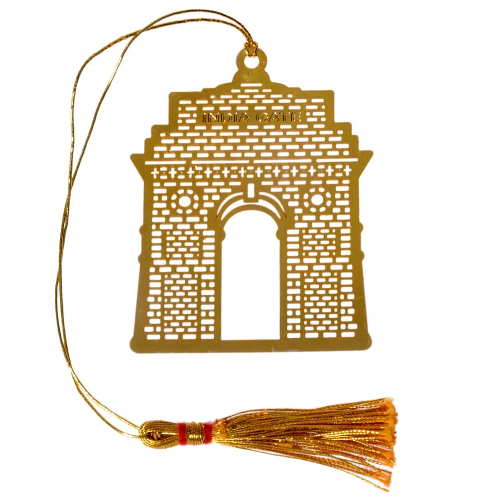 Die-cut gold-tone bookmark of India Gate with its arch and pierced brickwork, INDIA GATE lettered across the top, on a gold cord with a tassel