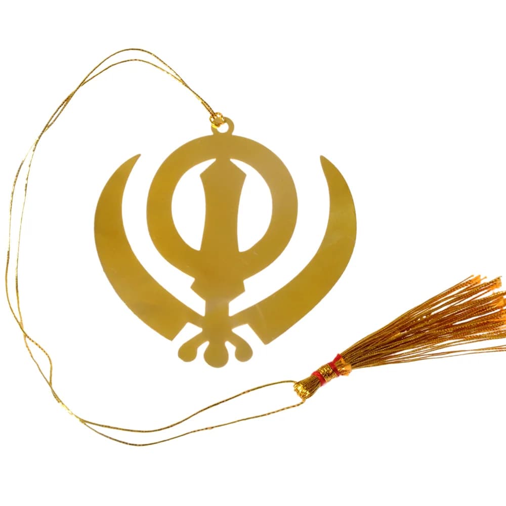 Die-cut gold-tone bookmark of the Sikh Khanda — a double-edged sword inside a chakkar between two crossed kirpans — on a gold cord with a tassel