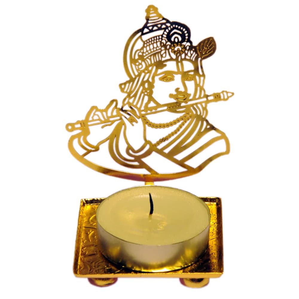 Pierced gold-tone tealight holder cut as Krishna at his flute in a peacock-feather crown, on a square tray