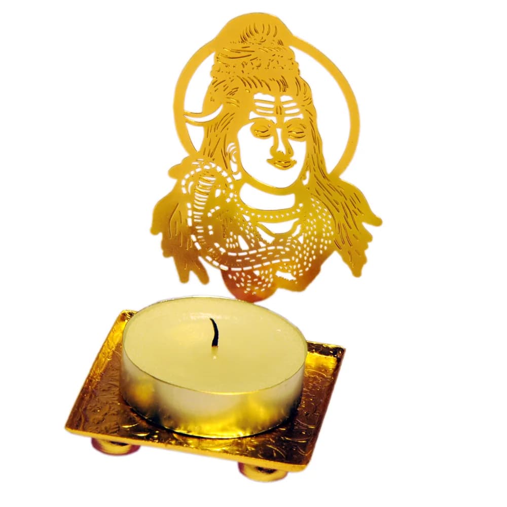 Pierced gold-tone tealight holder cut as the face of Lord Shiva with matted hair, a crescent moon and a serpent, on a square tray