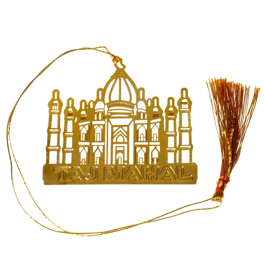 Die-cut gold-tone bookmark of the Taj Mahal with its dome and four minarets, TAJ MAHAL lettered on the plinth, on a gold cord with a tassel