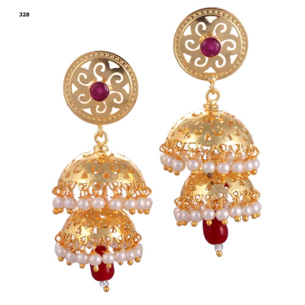 A pair of gold-plated jhumka earrings — a scrolled disc stud set with a red stone above two stacked perforated domes, both pearl-fringed, with a red glass teardrop at the centre