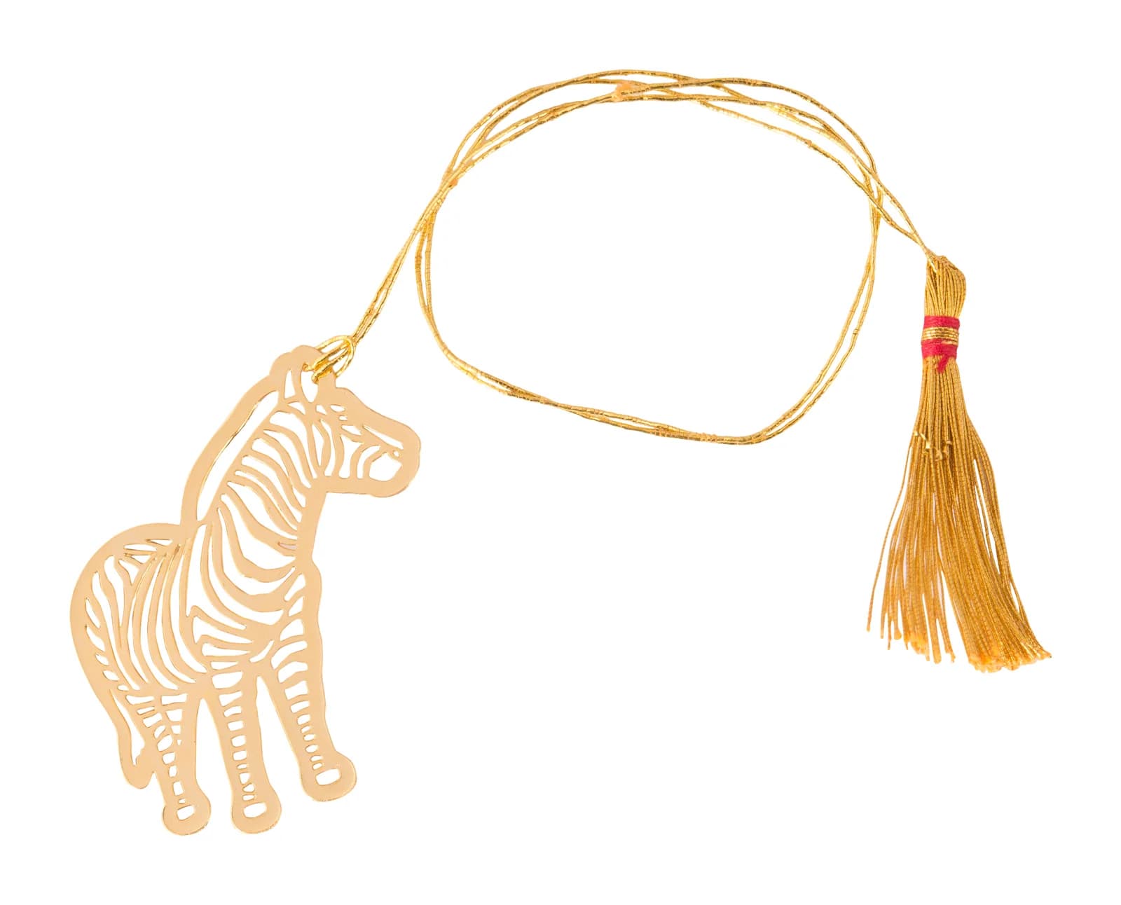 Die-cut gold bookmark of a standing zebra with its stripes cut right through the sheet, laid out with its gold cord and tassel