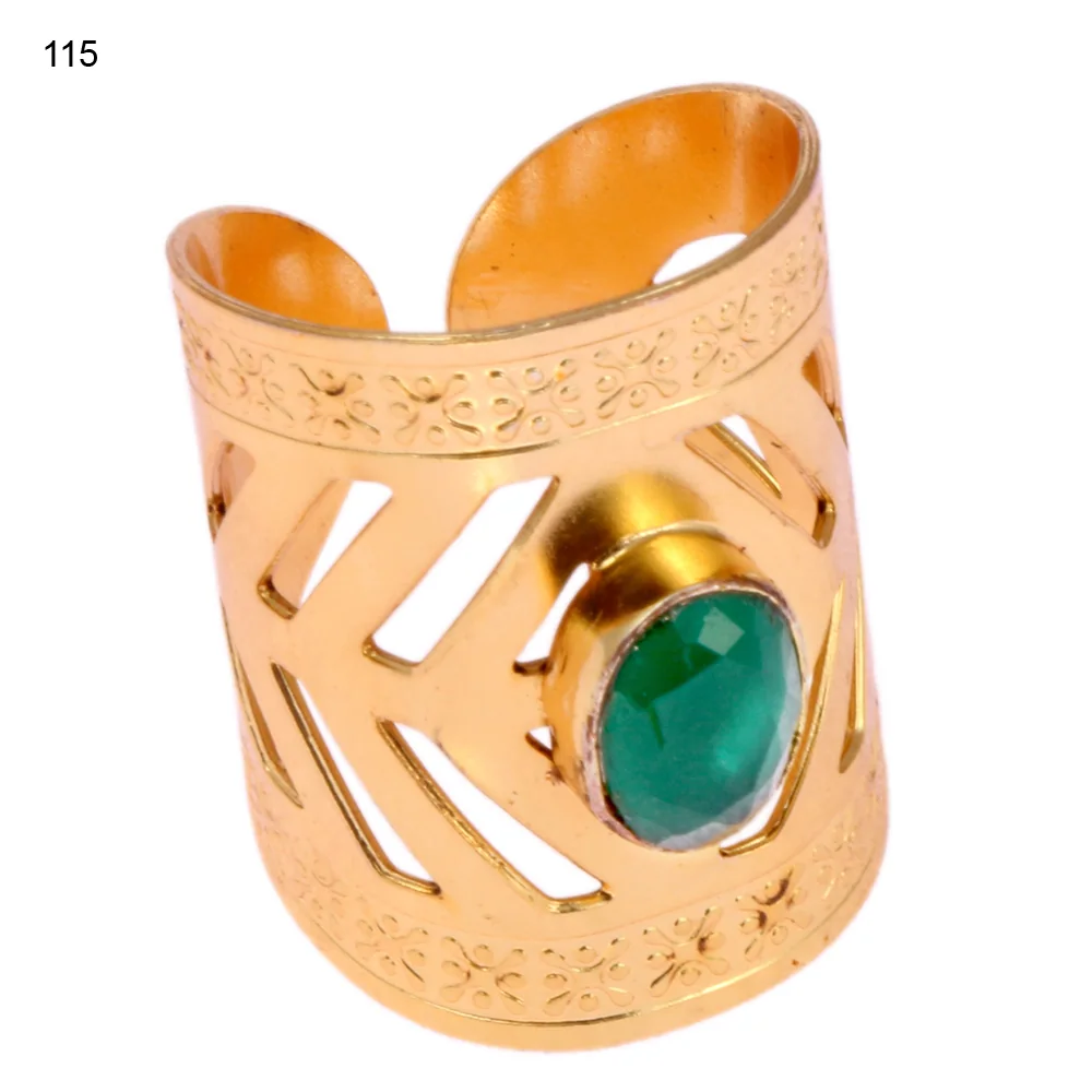 Gold-plated brass adjustable ring with a stacked chevron bar openwork band and a single bezel-set faceted green stone