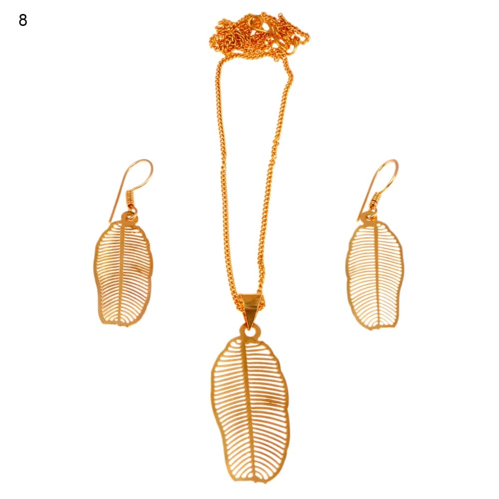 Gold-plated three-piece set with a slim oval leaf pendant and matching hook earrings, veined with fine parallel ribs combed out either side of a straight midrib