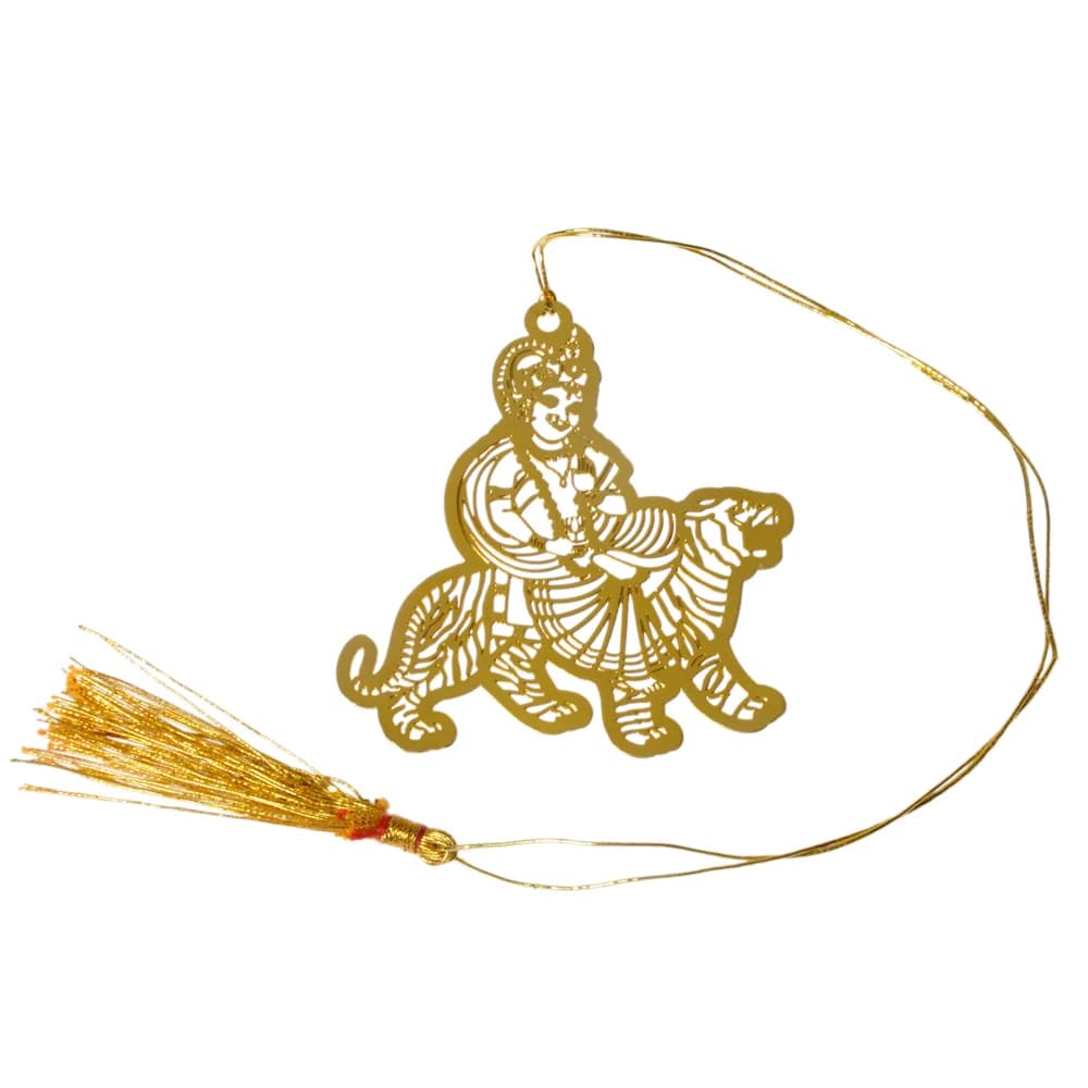 Die-cut gold-tone bookmark of the goddess Durga seated sidesaddle on her striped tiger, on a gold cord with a tassel