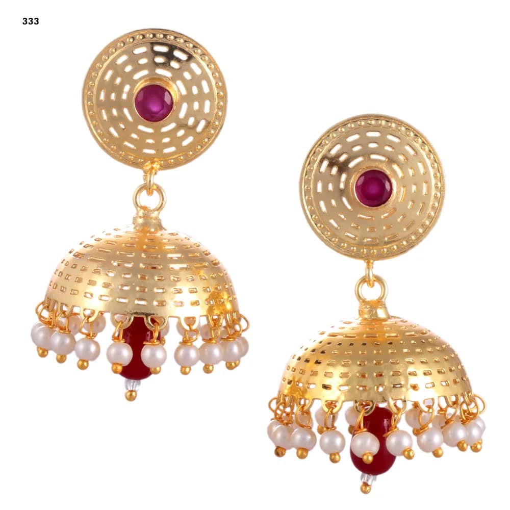A pair of gold-plated jhumka earrings — a pierced disc stud set with a red stone above a single wide perforated dome, pearl-fringed, with a red glass teardrop at the centre