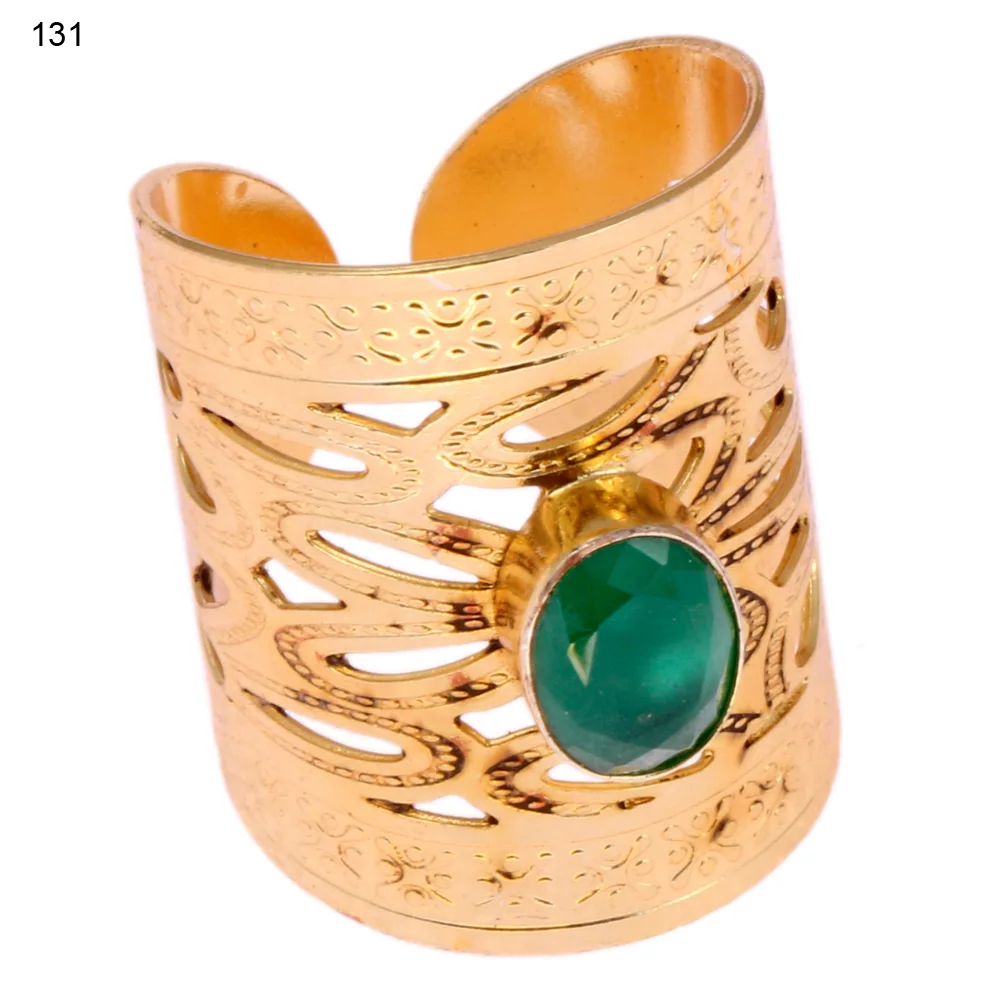 Gold-plated brass adjustable ring with a scrolled plume openwork band and a single bezel-set faceted green stone