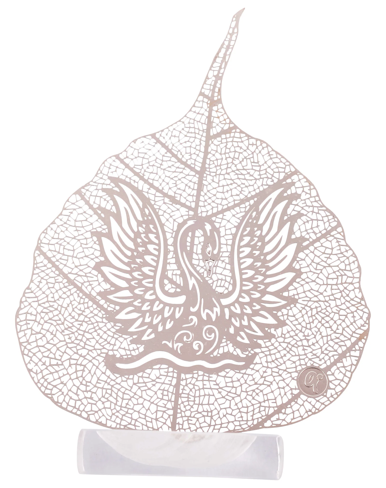 Silver skeletonised peepal leaf engraved with a swan on water with both wings raised, in a clear acrylic pedestal