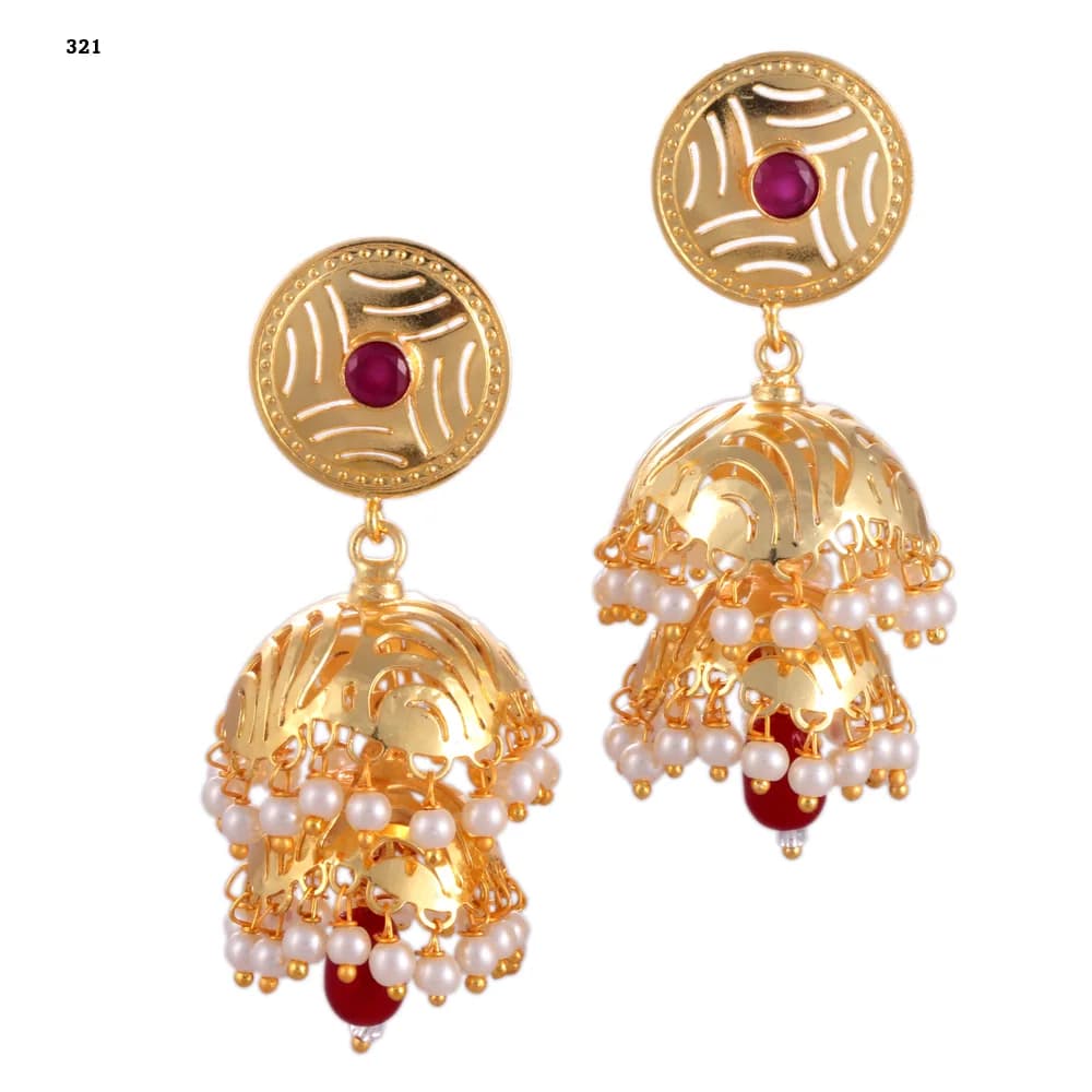 A pair of gold-plated jhumka earrings — a pierced disc stud set with a red stone above two stacked perforated domes, both pearl-fringed, with a red glass teardrop at the centre