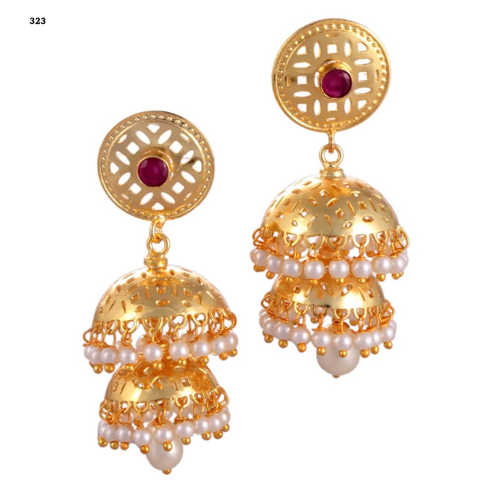 A pair of gold-plated jhumka earrings — a pierced disc stud set with a red stone above two stacked perforated domes, both pearl-fringed, with a pearl drop at the centre