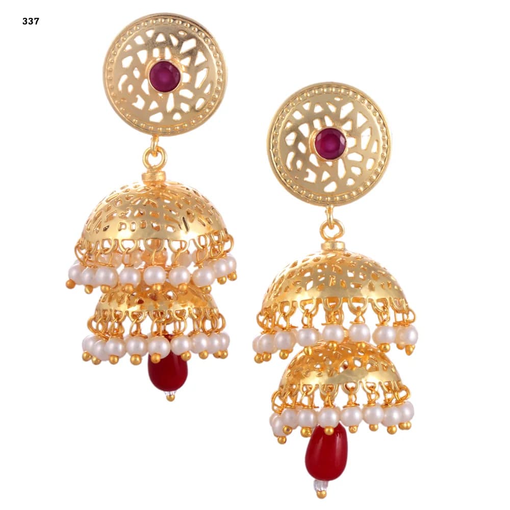 A pair of gold-plated jhumka earrings — a pierced disc stud set with a red stone above two stacked perforated domes, both pearl-fringed, with a red glass teardrop at the centre